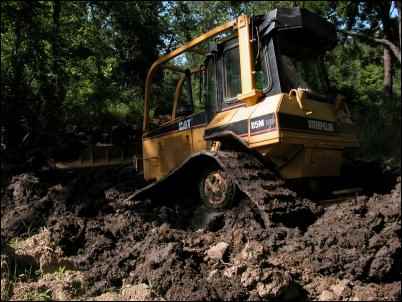 bulldozer in mud
