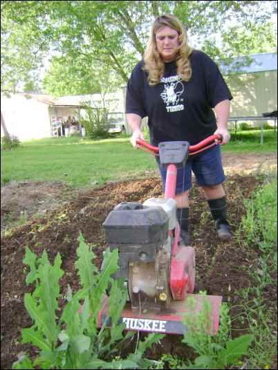 My wife uses the tiller to break new ground for expansion of her garden. Since the area was used as a garden decades ago it is already void of large rocks. Creating a new vegetable garden patch will go faster if you turn over the soil with a tractor and plow the first time. Many country folks have the equipment and will cultivate a garden spot for a minimal charge.